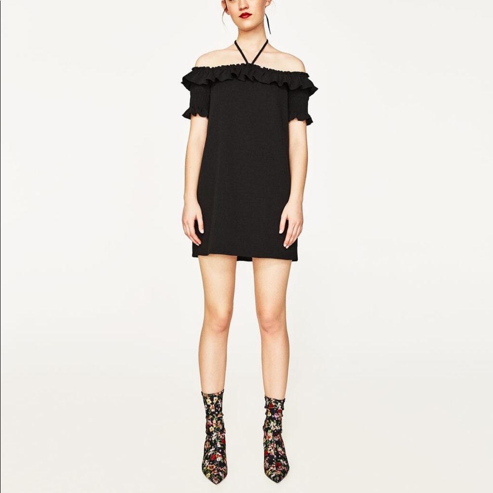 • Frilled Dress with Bow Detail •